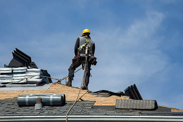 Professional Roofing technician working in Glen Head, NY